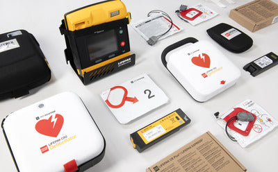 A collage of LIFEPAK AEDs and their accessories of various sizes