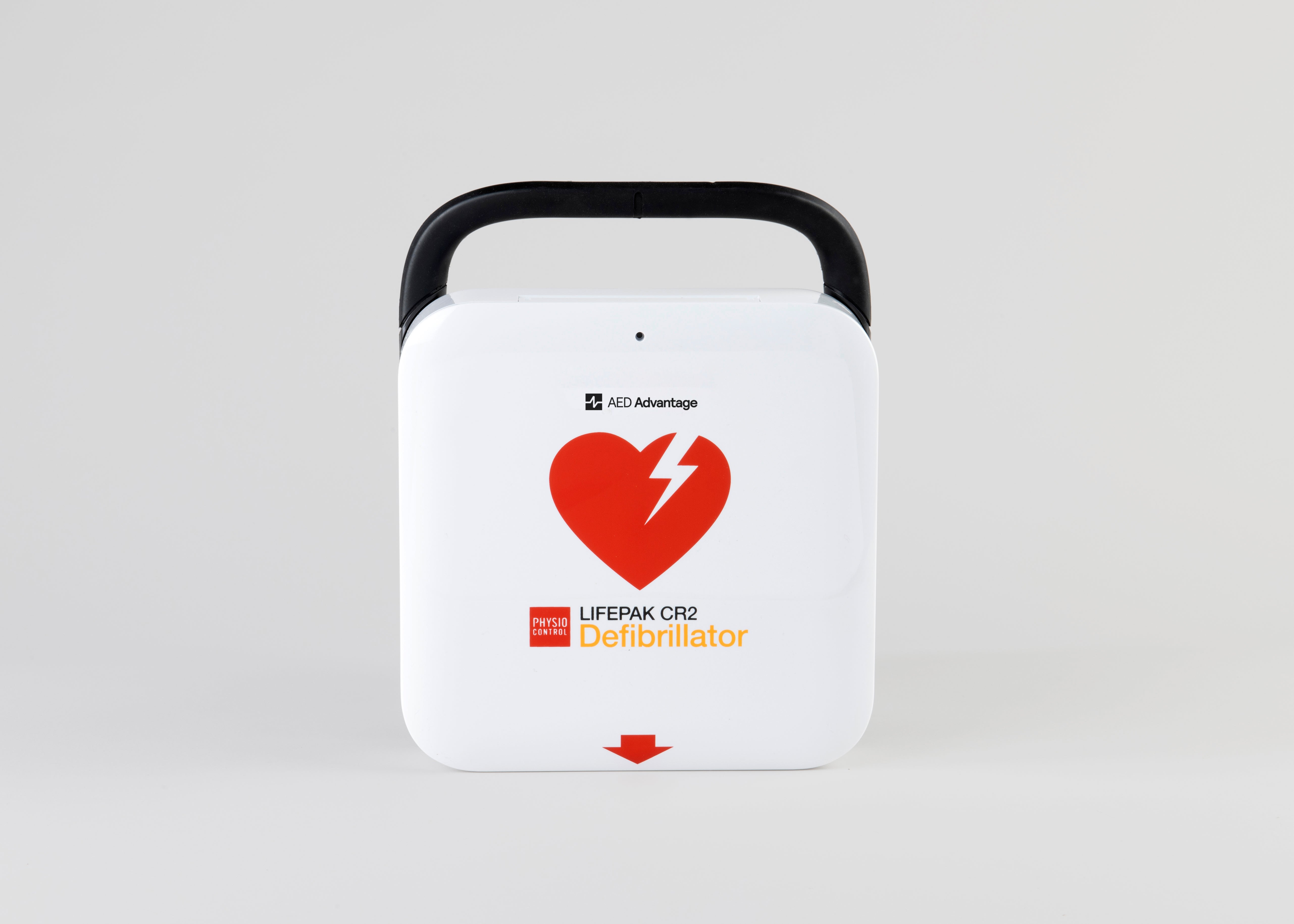 A white and red lifepak cr2 defibrillator with a black handle.