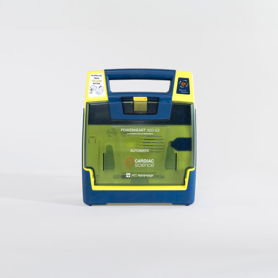A blue and yellow Powerheart G3 AED with a blue carry handle.