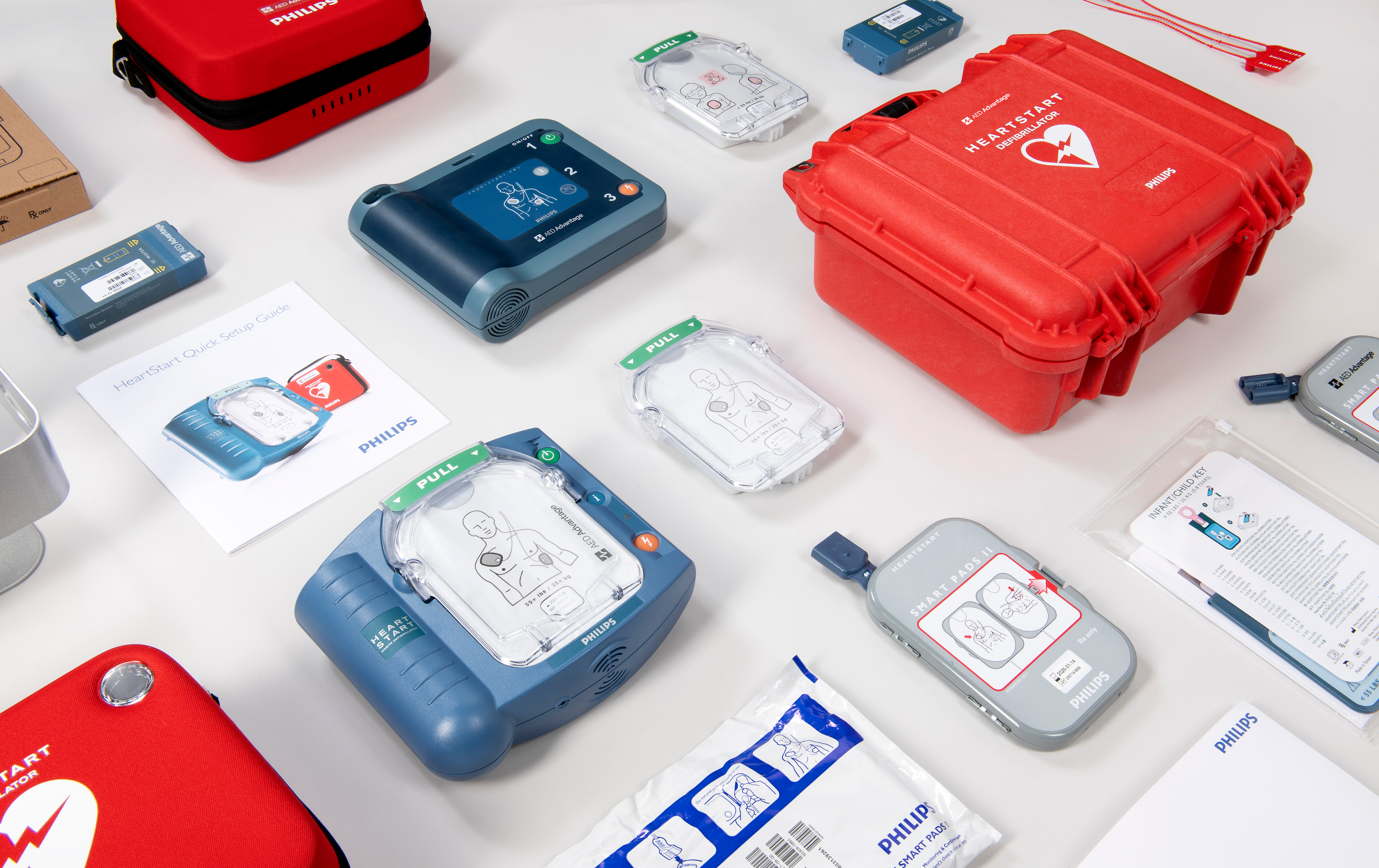 A collage of Philips AEDs, their accessories, and storage.