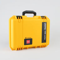 A bright yellow hard carrying case with a black handle meant to securely store and move a LIFEPAK 1000 defibrillator