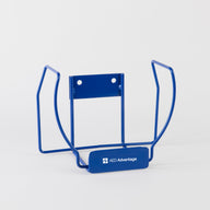 A blue metal wall mount bracket meant to store a HeartSine AED