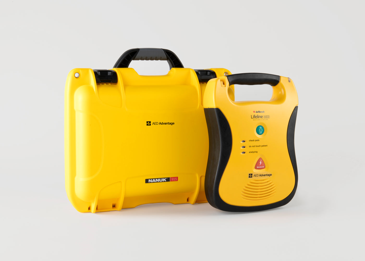 A yellow and black Defibtech Lifeline AED with a bright yellow hardshell carry case