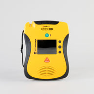 A black and yellow Defibtech Lifeline VIEW AED displayed head on with its battery pack and electrodes. 
