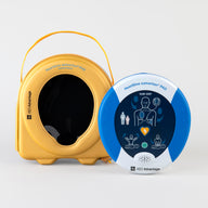 A blue and gray HeartSine 350P AED standing next to its yellow softshell carry case