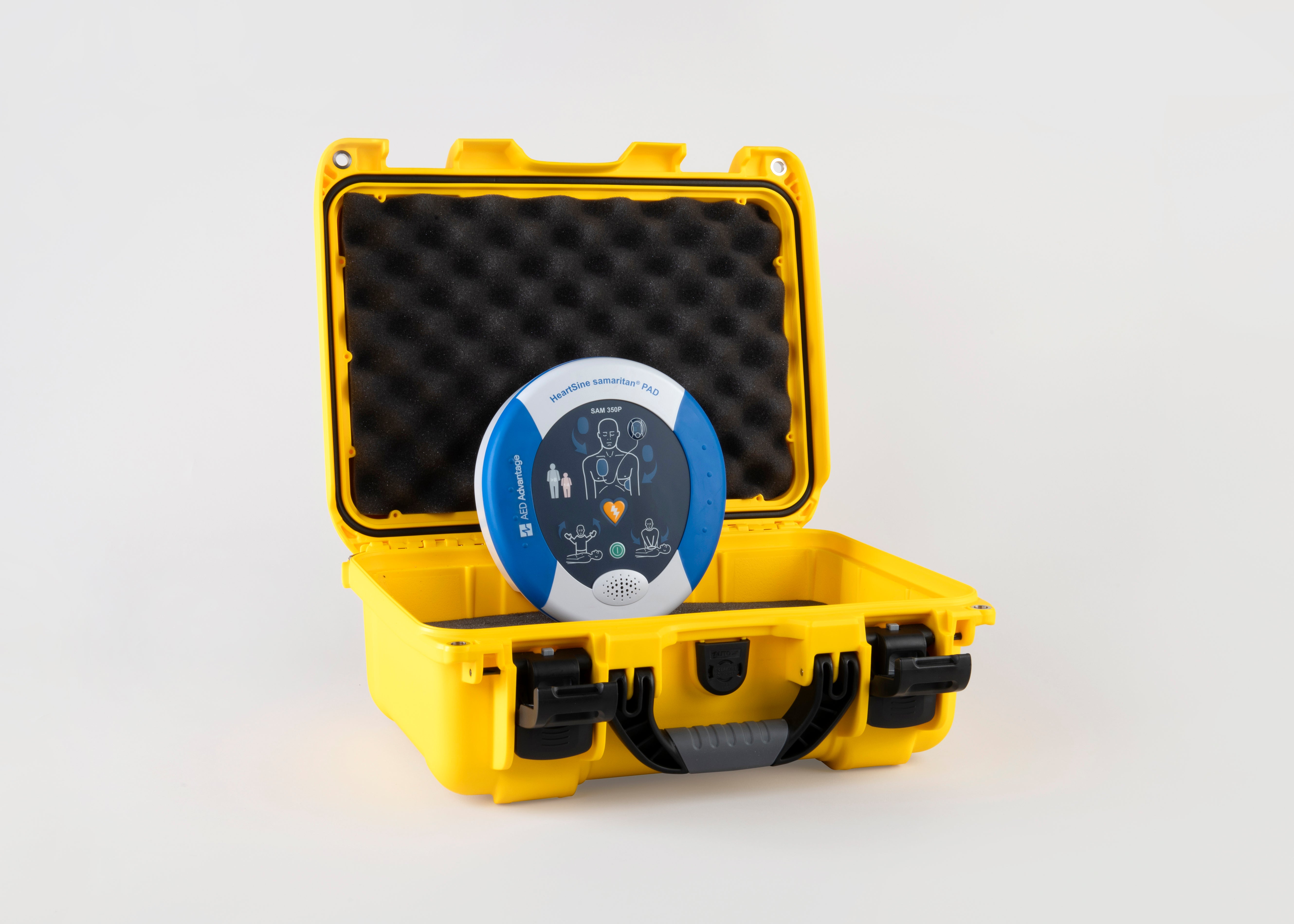 A blue and gray HeartSine 350P AED inside a bright yellow hardshell carry case