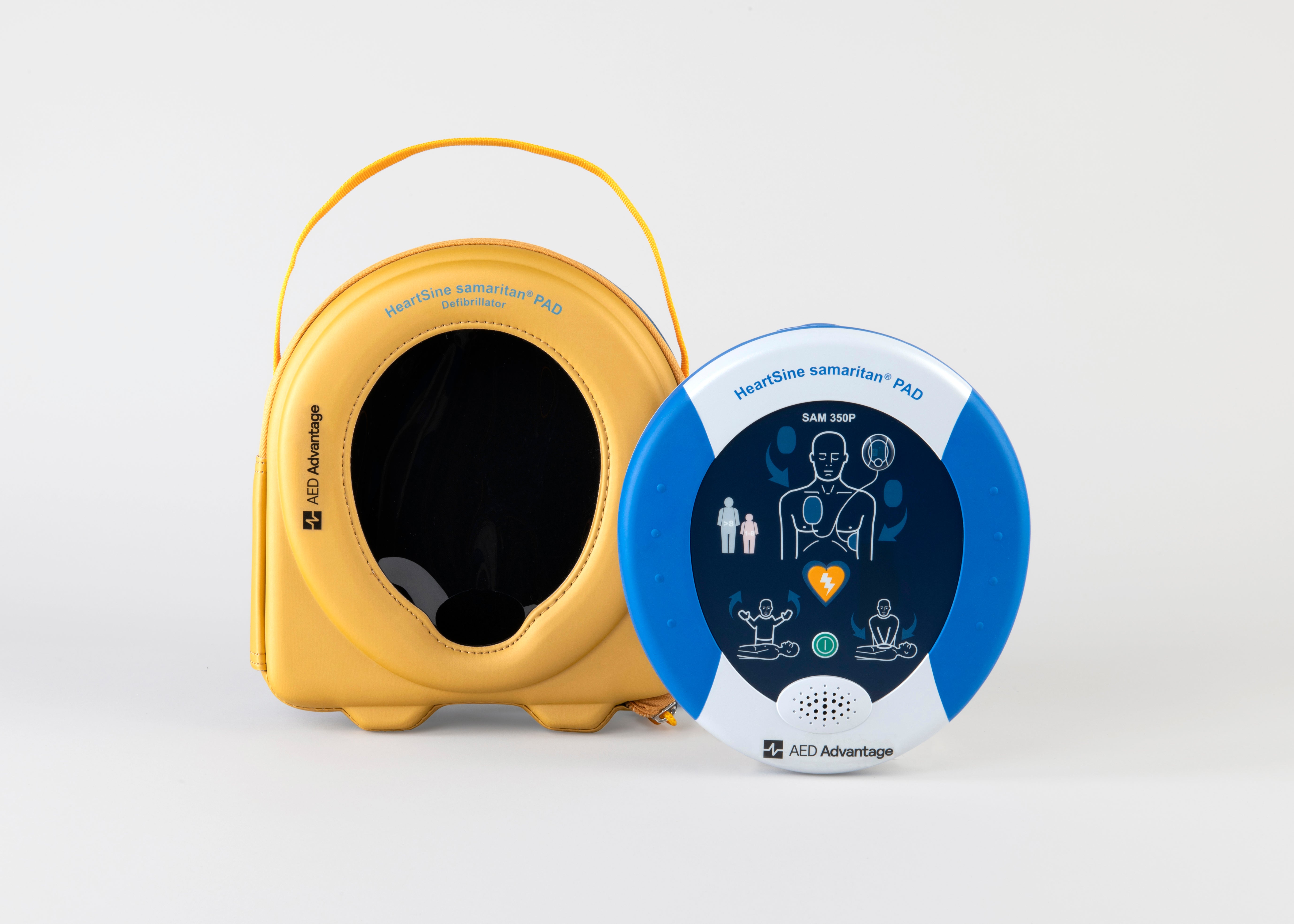 A blue and gray HeartSine 350P AED standing next to its yellow softshell carry case