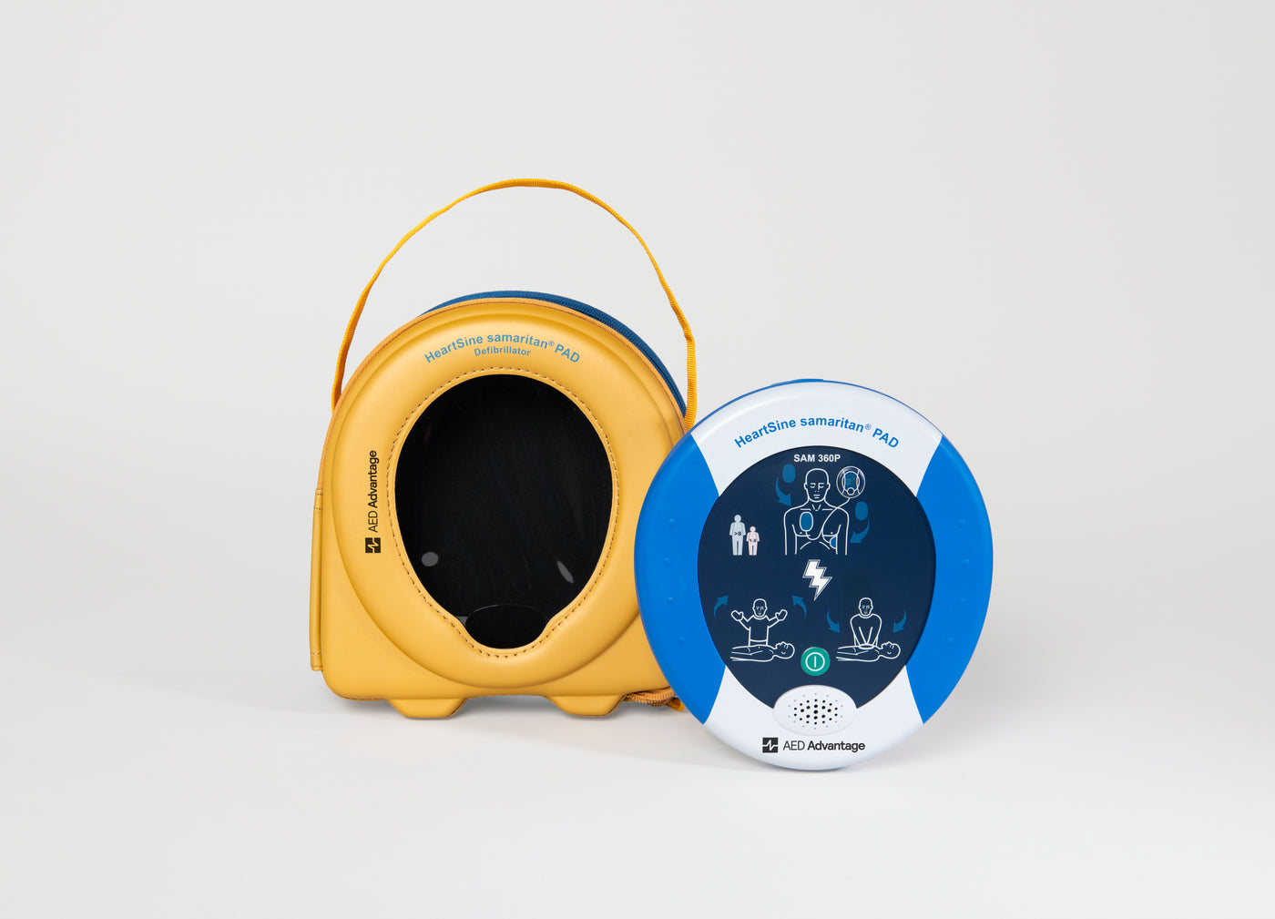A blue and gray HeartSine 360P AED standing next to its yellow softshell carry case