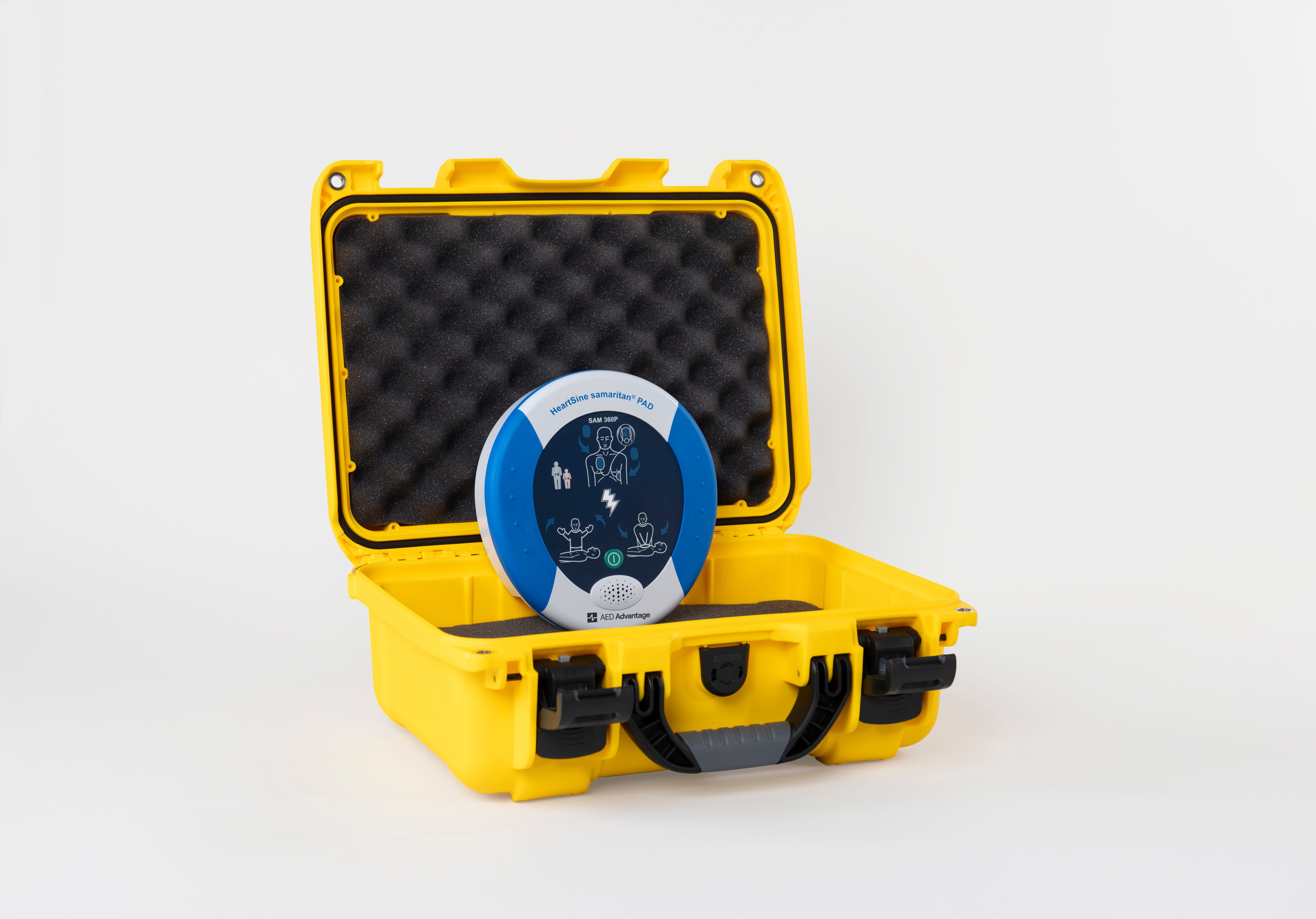 A blue and gray HeartSine 360P AED inside a bright yellow hardshell carry case