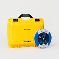 A blue and gray HeartSine 360P AED standing next to a bright yellow hardshell carry case
