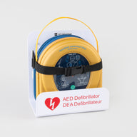 A HeartSine 500P AED in its yellow carry case strapped into a white wall mount bracket