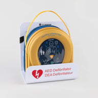 A HeartSine 350P AED in its yellow carry case displayed in a white wall mount bracket