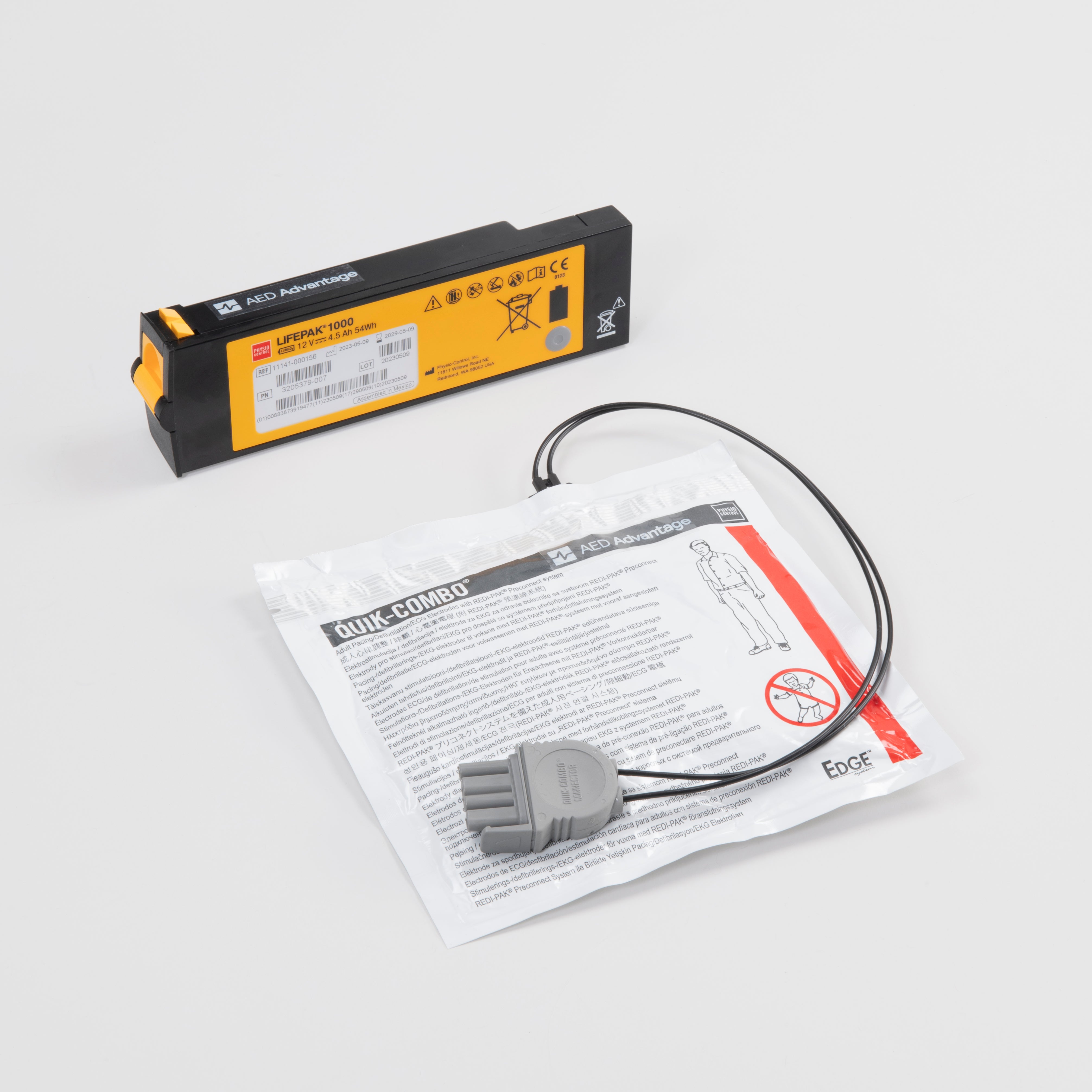 White electrodes package and black and yellow battery for the LIFEPAK 1000 defibrillator