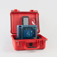 A blue Philips FRx AED machine inside a bright red hardshell carry case