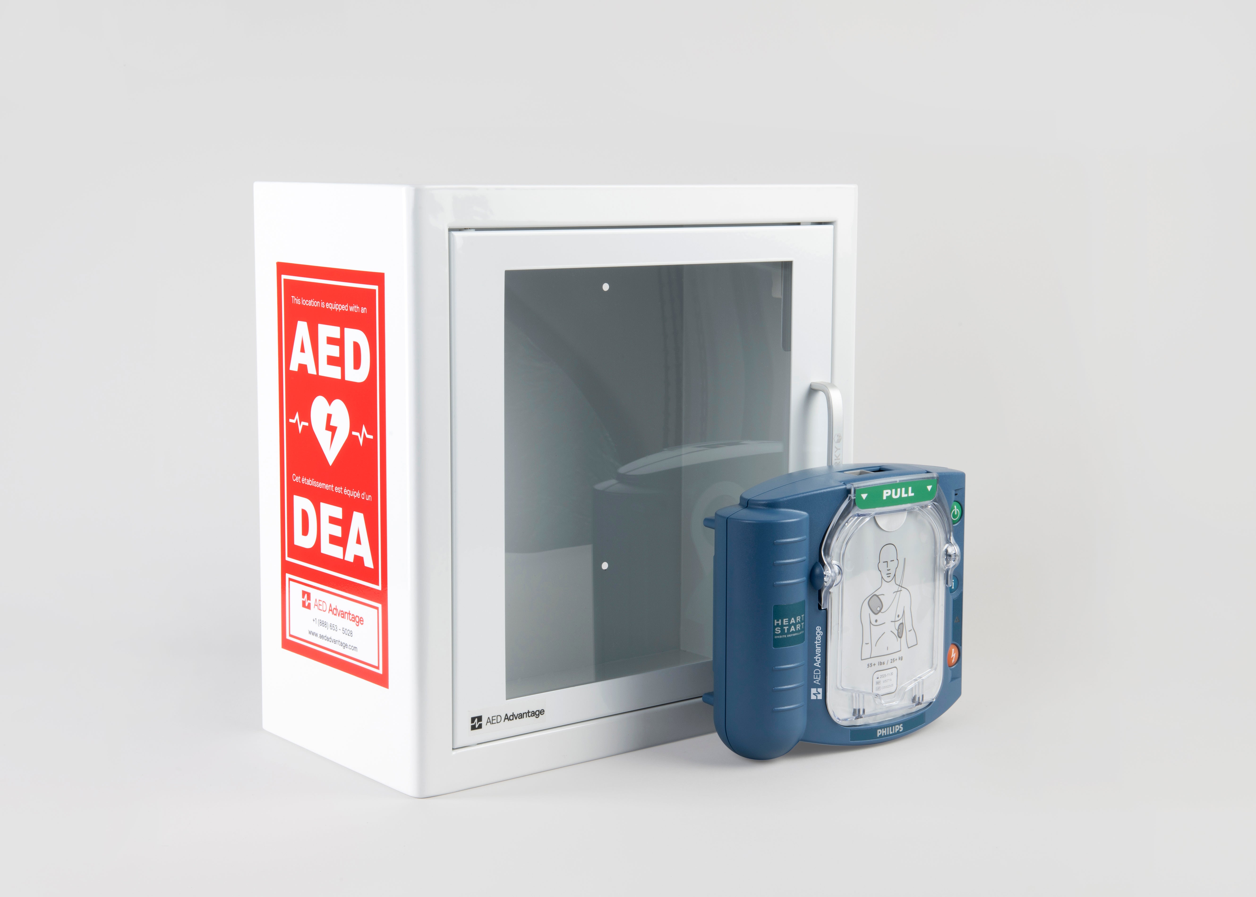 A blue Philips OnSite AED standing in front of a white metal cabinet with red decals