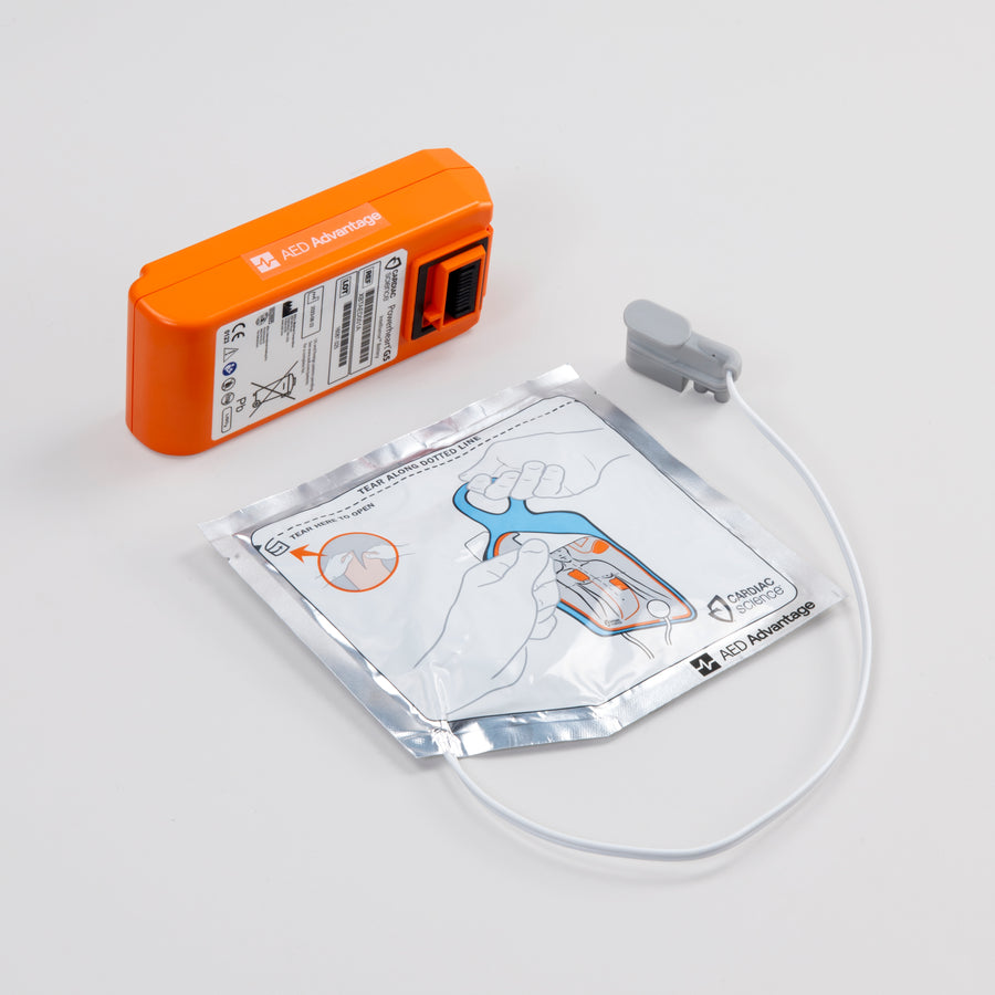 White electrodes package and bright orange battery pack for the Powerheart G5 defibrillator