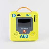A green ZOLL AED 3 machine with an orange carry handle