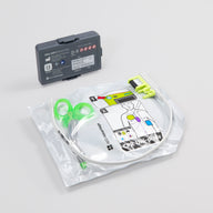 white electrodes package and gray battery pack for the ZOLL 3 defibrillator