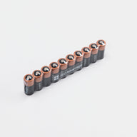 A set of ten small black and brown lithium batteries for the zoll aed plus defibrillator